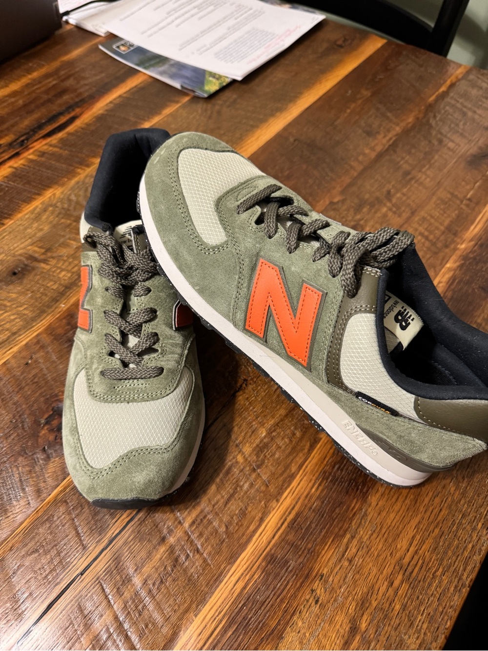 New Balance Men's 574 Olive Green Retro Runner with Orange N size 11.5
